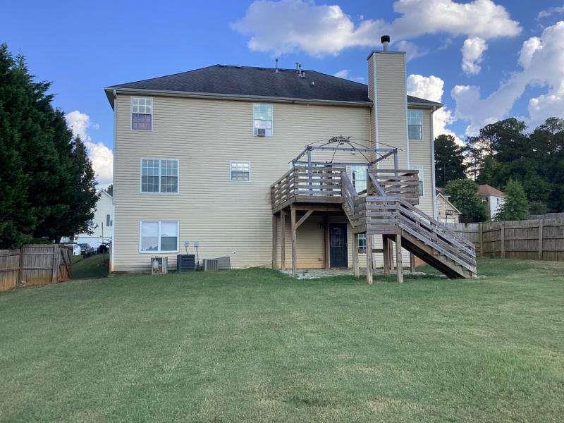 485 Brunswick Circle Stockbridge, GA 30281 - Photo 28 of 31 a view of a house with a backyard