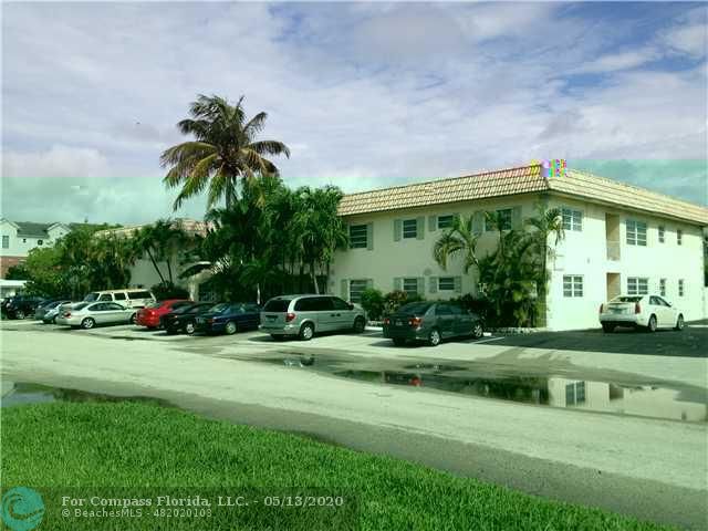 2131 Northeast 41st Street, Unit 104 Lighthouse Point, FL 33064 - Photo 5 of 6 Exterior Front