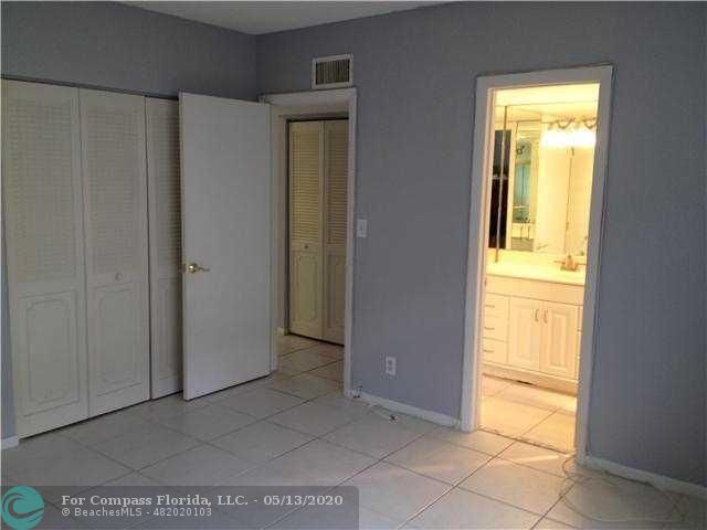 2131 Northeast 41st Street, Unit 104 Lighthouse Point, FL 33064 - Photo 6 of 6 Exterior Front