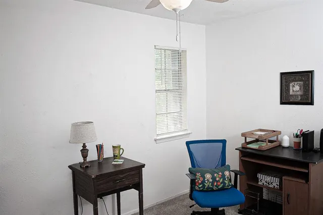 a room with furniture and wooden floor