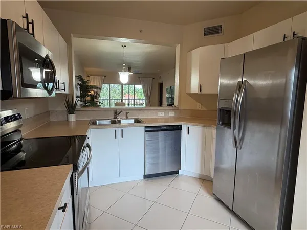 $2,100 | 7839 Regal Heron Circle, Unit 202, Naples, FL 34104