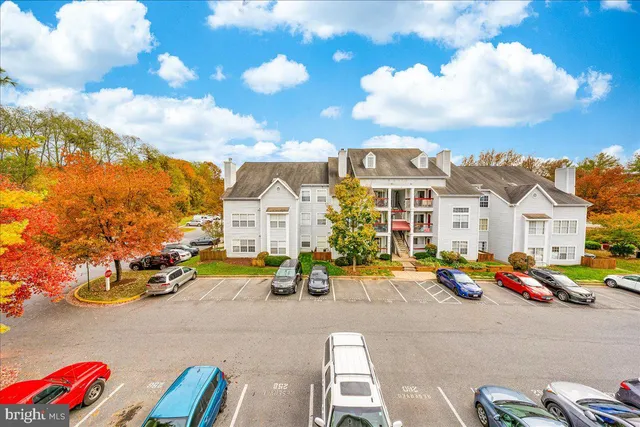 a view of multiple houses with a street