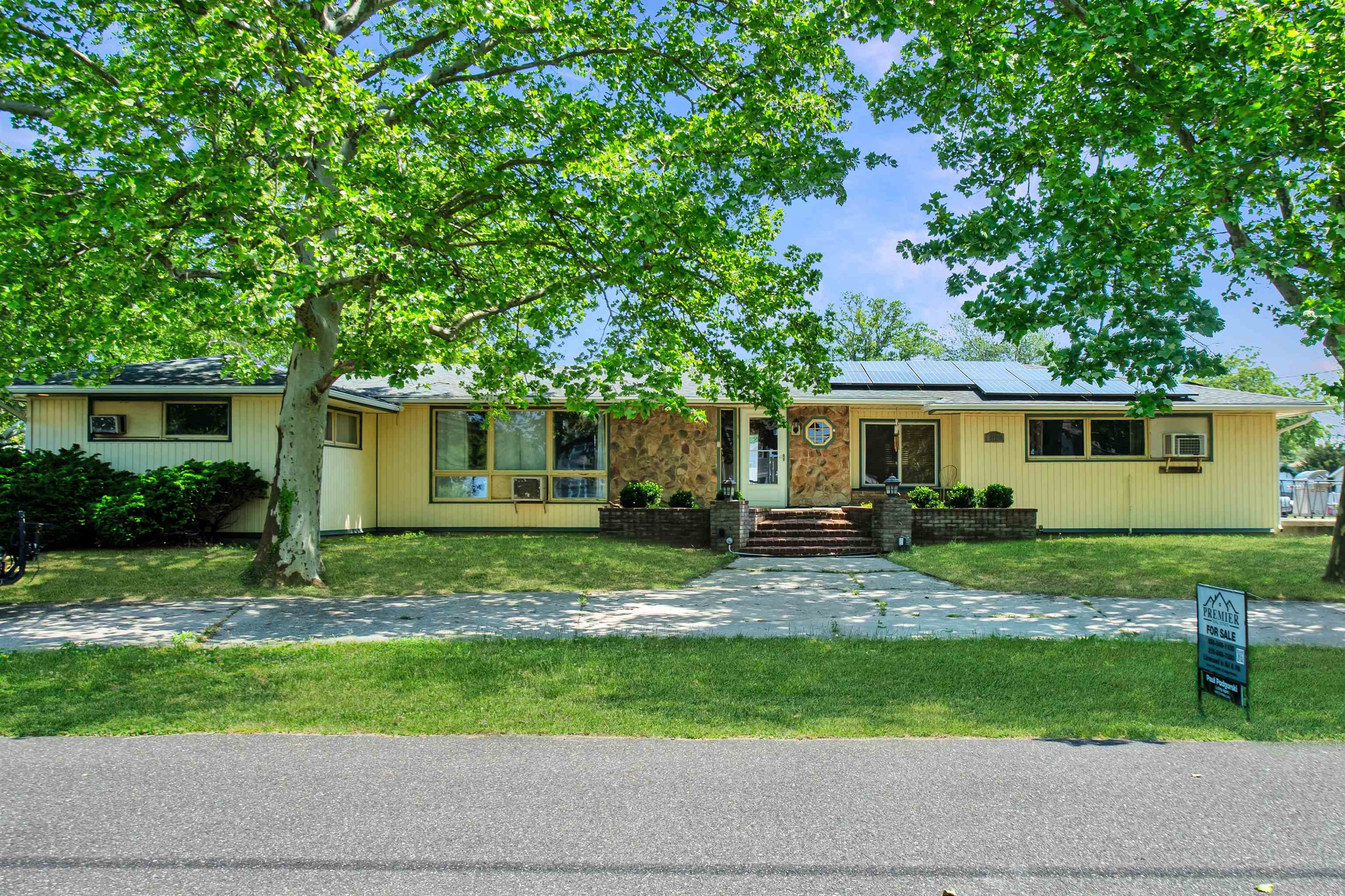 210 South Railroad Avenue Rio Grande, NJ 08242 - Photo 2 of 36 a view of a house with a yard