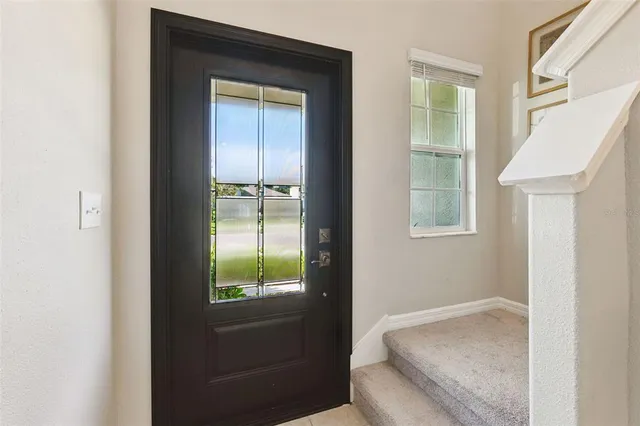 a room that has a bed and a window