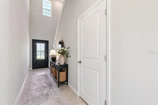 a view of a hallway with front door