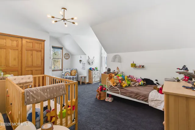 a bedroom with furniture and a couch