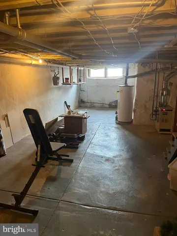 a workspace with furniture and a window