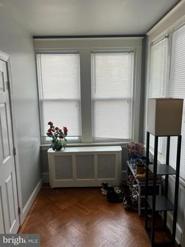a room with furniture and a window