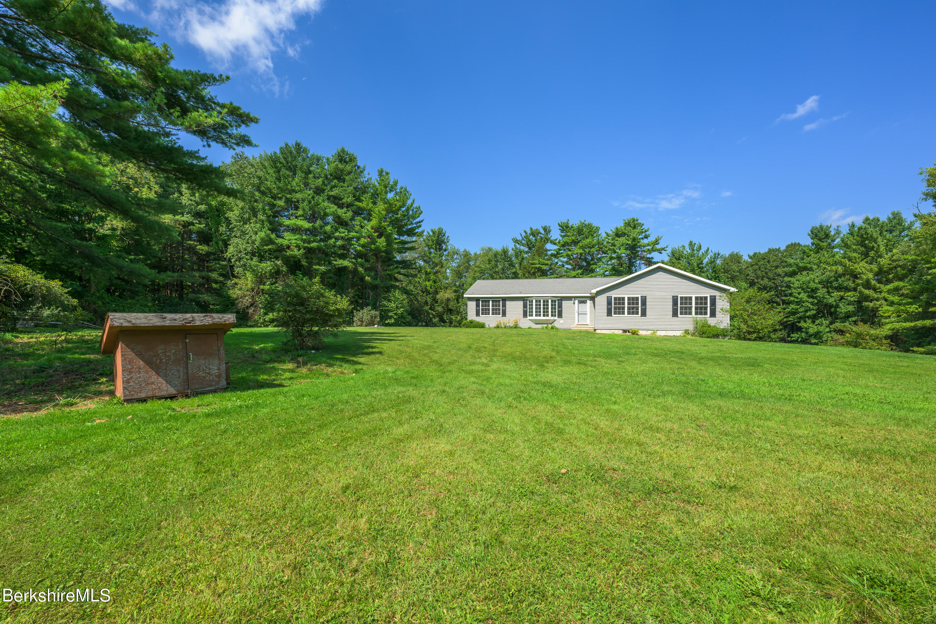 50 Branch Farm Road Richmond, MA 01201 - Photo 1 of 25 a house view with a garden space