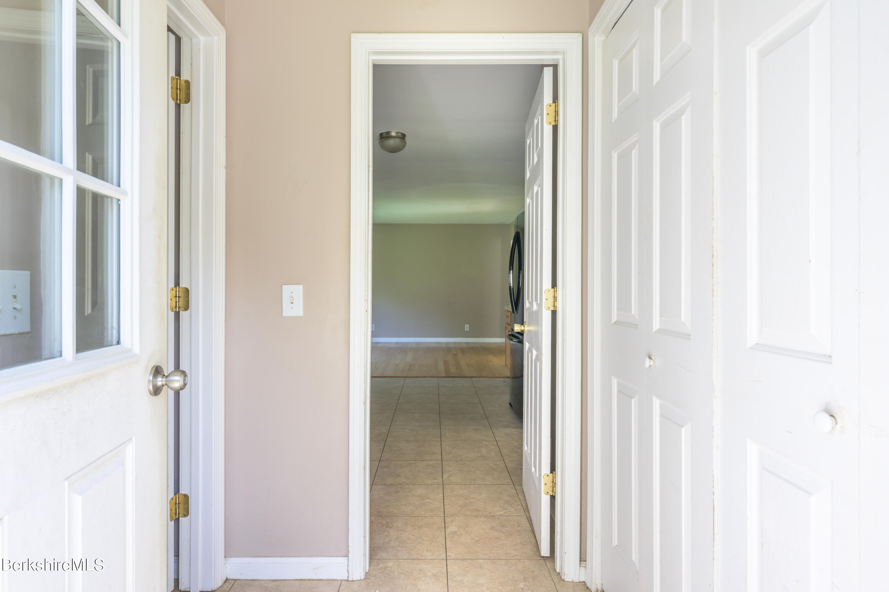 50 Branch Farm Road Richmond, MA 01201 - Photo 19 of 25 a view of a bathroom from a corridor