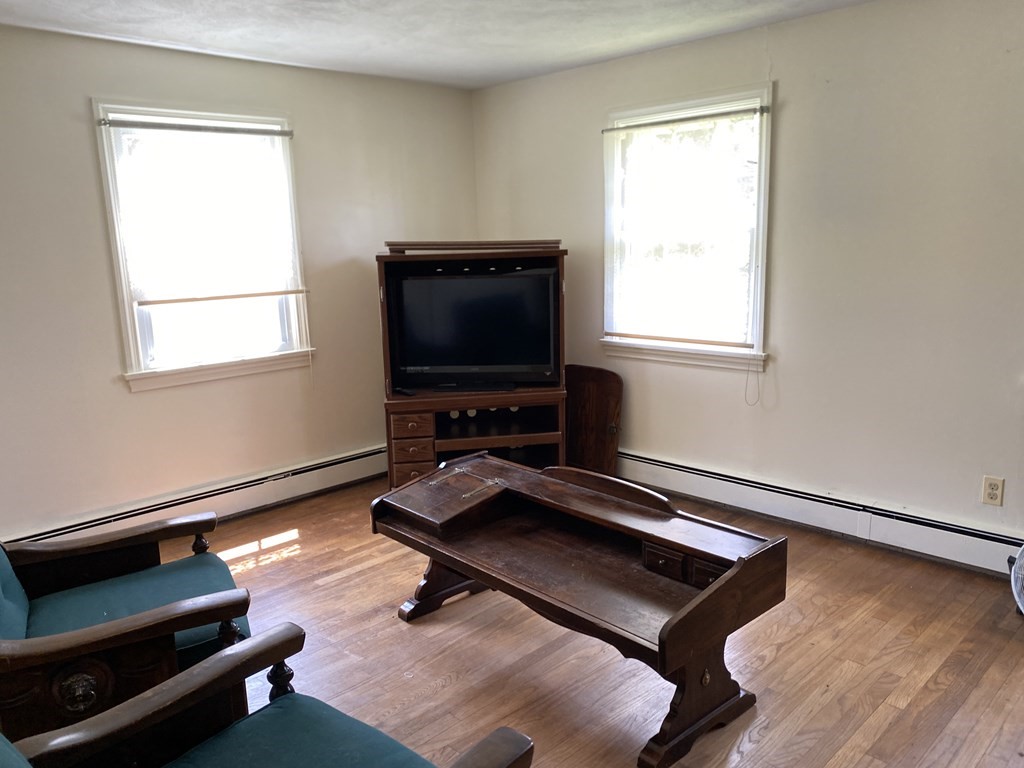 31 Upper Palmer Road Monson, MA 01057 - Photo 13 of 22 a living room with furniture pool table and a window