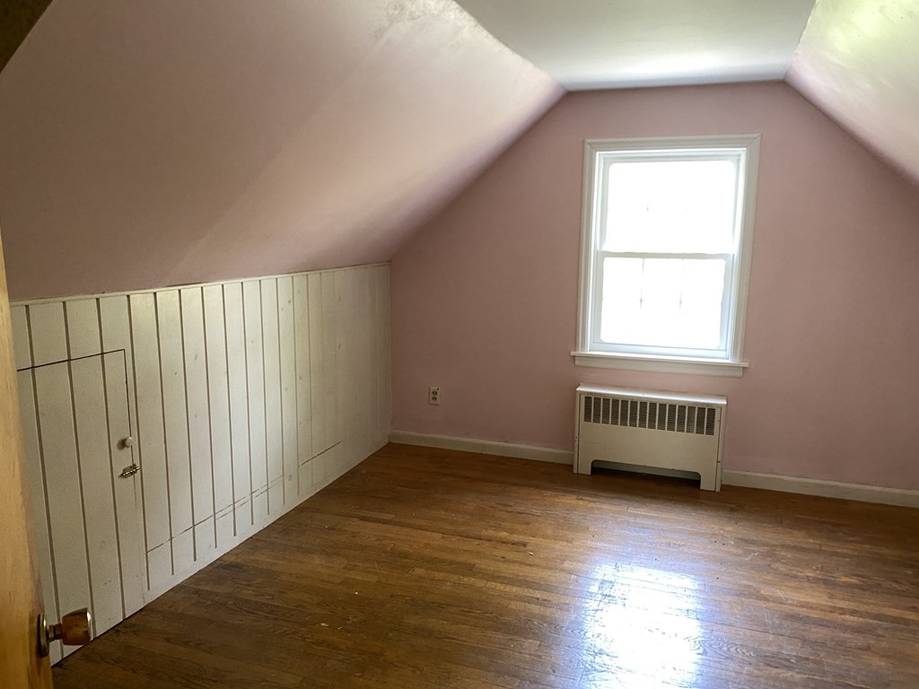 31 Upper Palmer Road Monson, MA 01057 - Photo 15 of 22 an empty room with wooden floor and windows