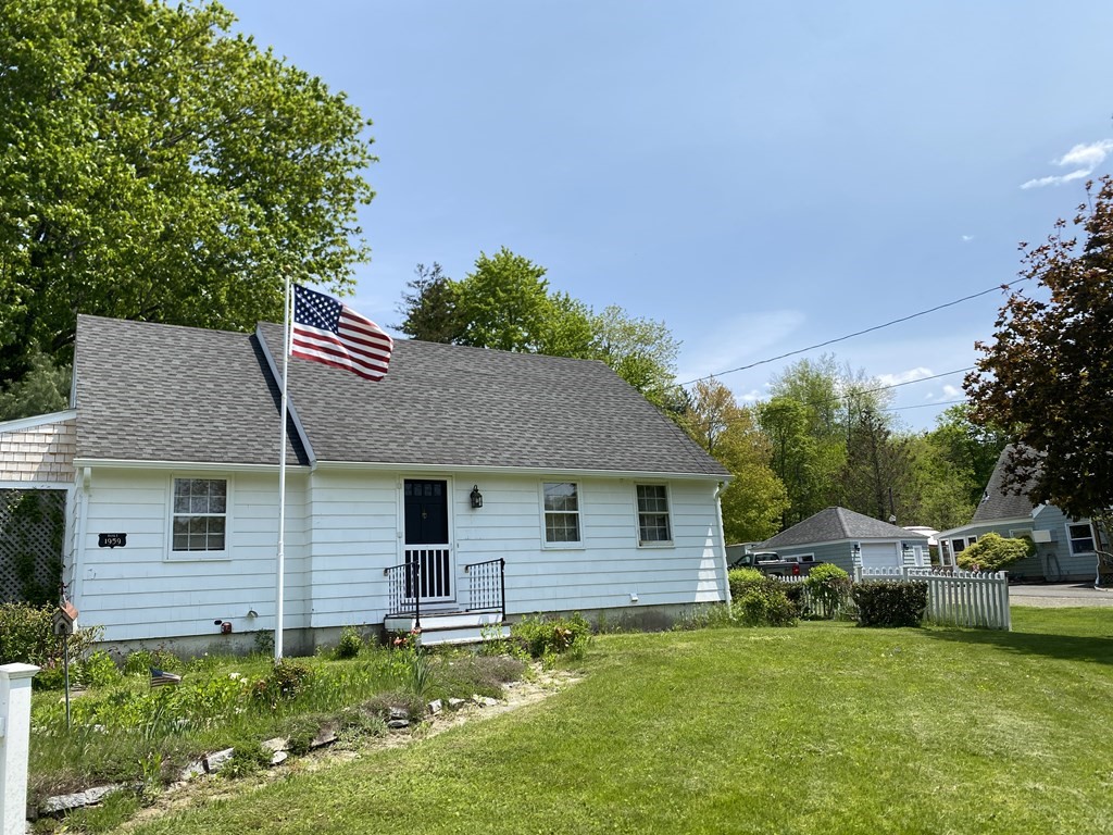 31 Upper Palmer Road Monson, MA 01057 - Photo 2 of 22 a front view of a house with a garden