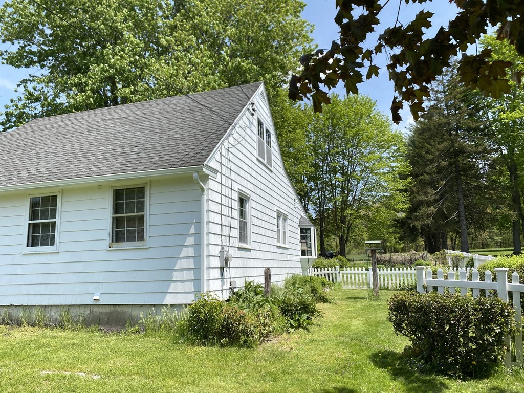 31 Upper Palmer Road Monson, MA 01057 - Photo 4 of 22 a view of a house with a yard