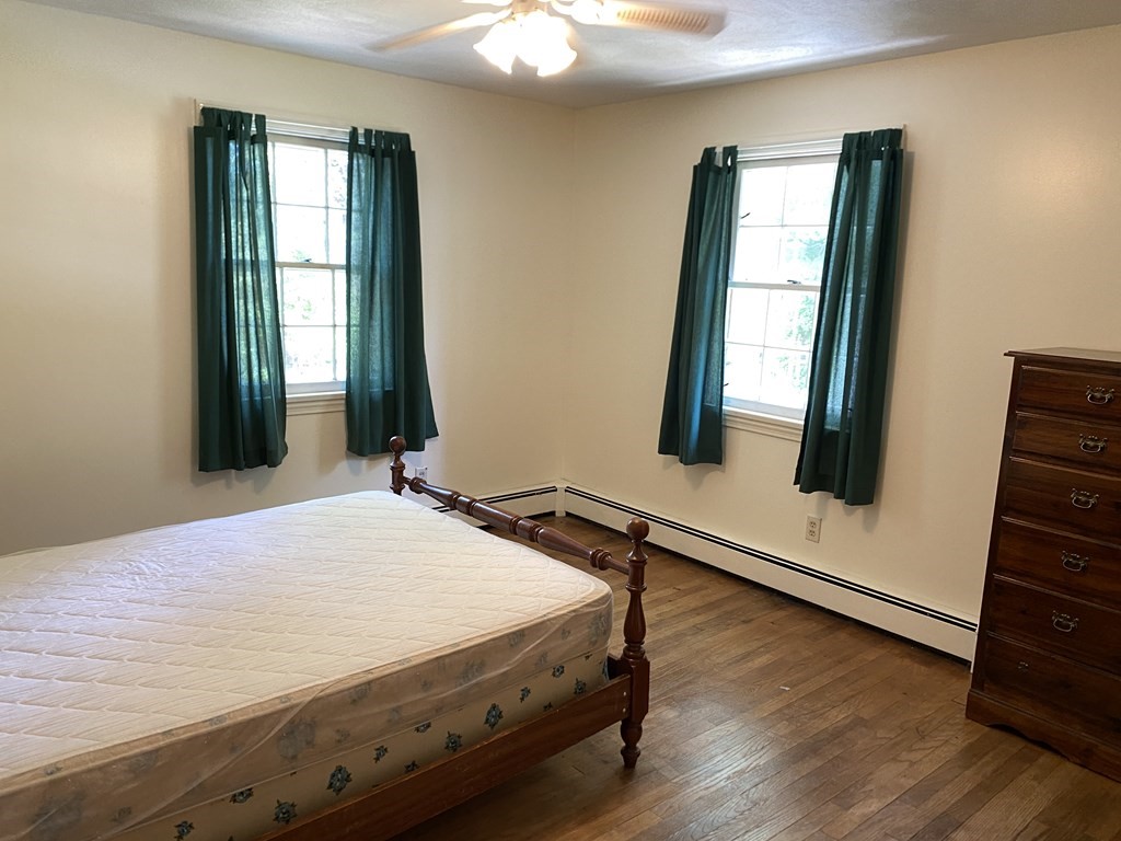 31 Upper Palmer Road Monson, MA 01057 - Photo 6 of 22 a bedroom with a bed and a window