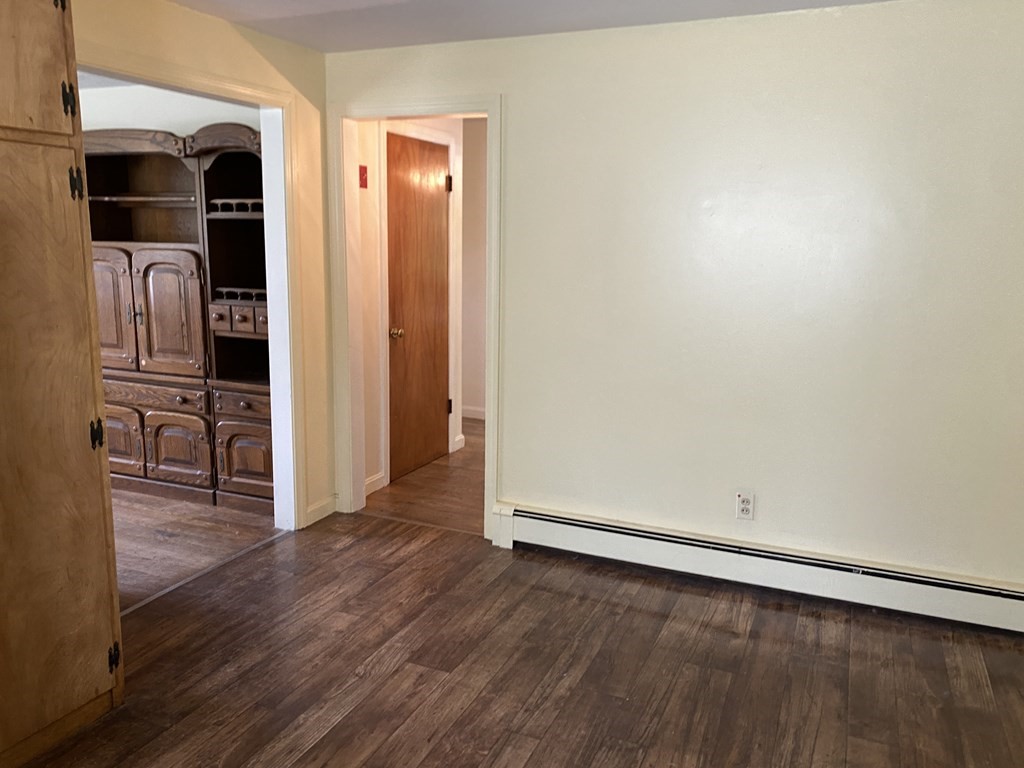 31 Upper Palmer Road Monson, MA 01057 - Photo 9 of 22 an empty room with wooden floor
