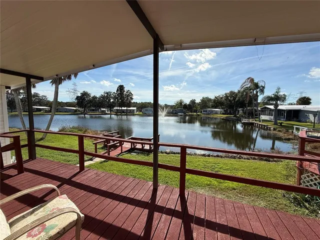 a view of a lake from a balcony