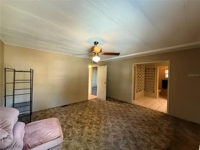 a bathroom with a sink a mirror and a shower