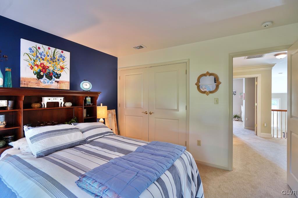 3280 Gun Club Road Nazareth, PA 18064 - Photo 25 of 34 a bedroom with a bed and cupboard