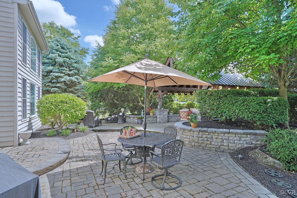 3280 Gun Club Road Nazareth, PA 18064 - Photo 29 of 34 an outdoor space with furniture and umbrella