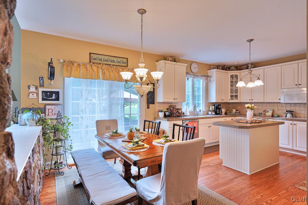 3280 Gun Club Road Nazareth, PA 18064 - Photo 7 of 34 a view of a dining room with furniture window and wooden floor