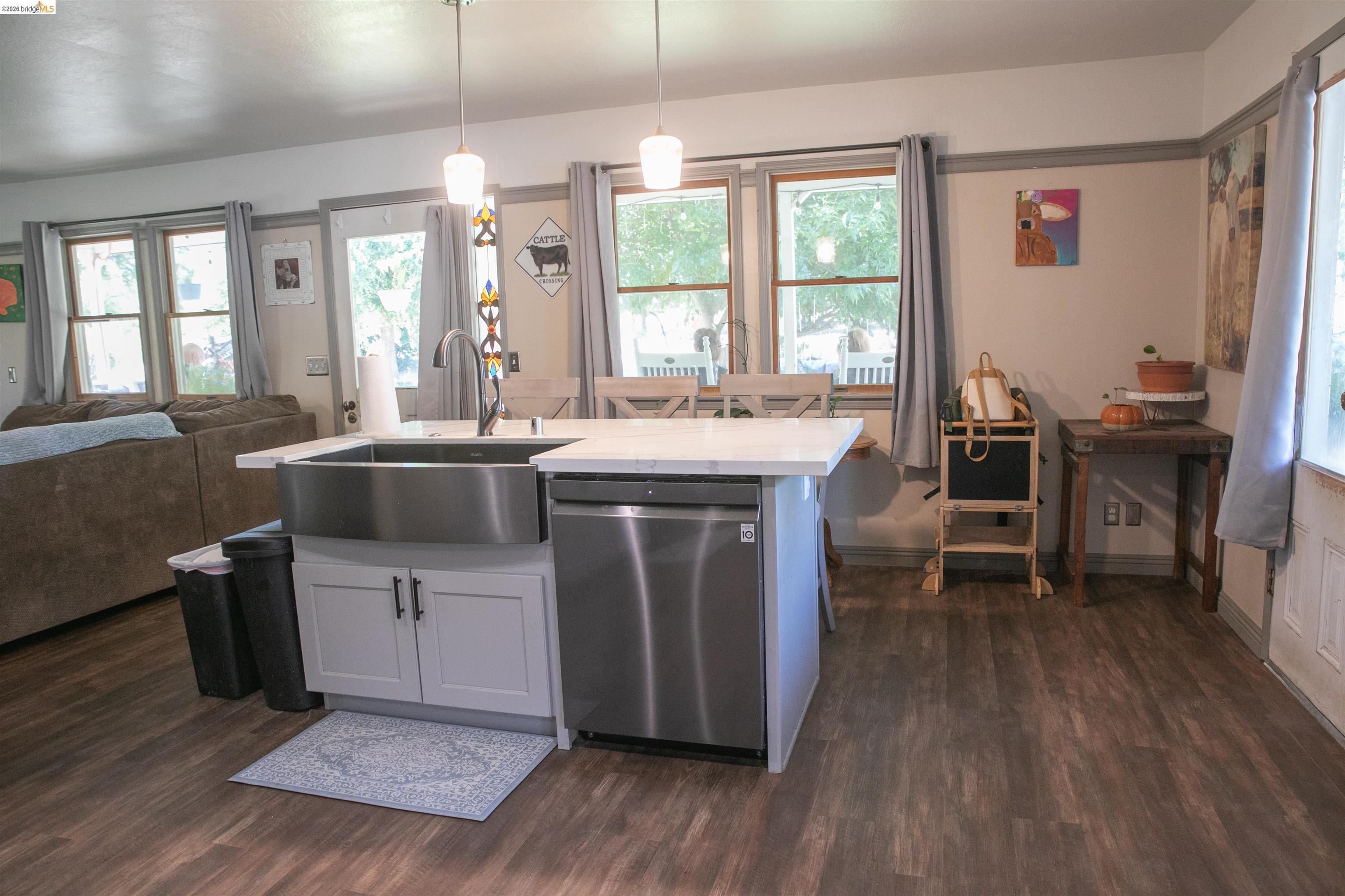 20982 Shaws Flat Road Sonora, CA 95370 - Photo 8 of 26 Kitchen island with stainless steel farmhouse sink and integrated dishwasher