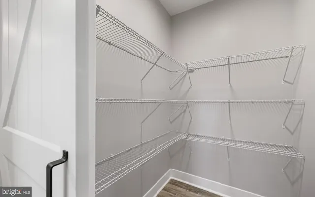 a view of an empty walk in closet