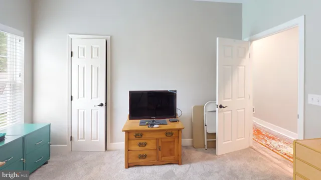 a view of a porch with wooden floor and fence