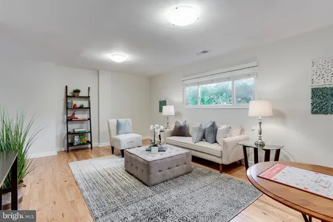 a living room with furniture and a couch