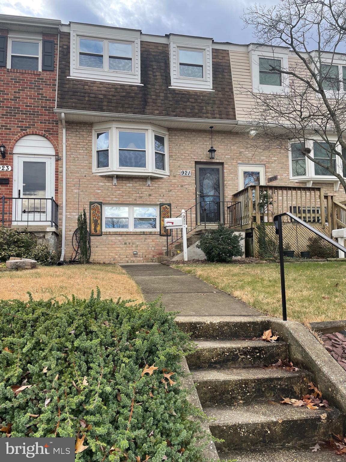 921 Elm Road Halethorpe, MD 21227 - Photo 2 of 3 a front view of a house with a yard