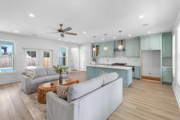 a kitchen with a stove and a sink