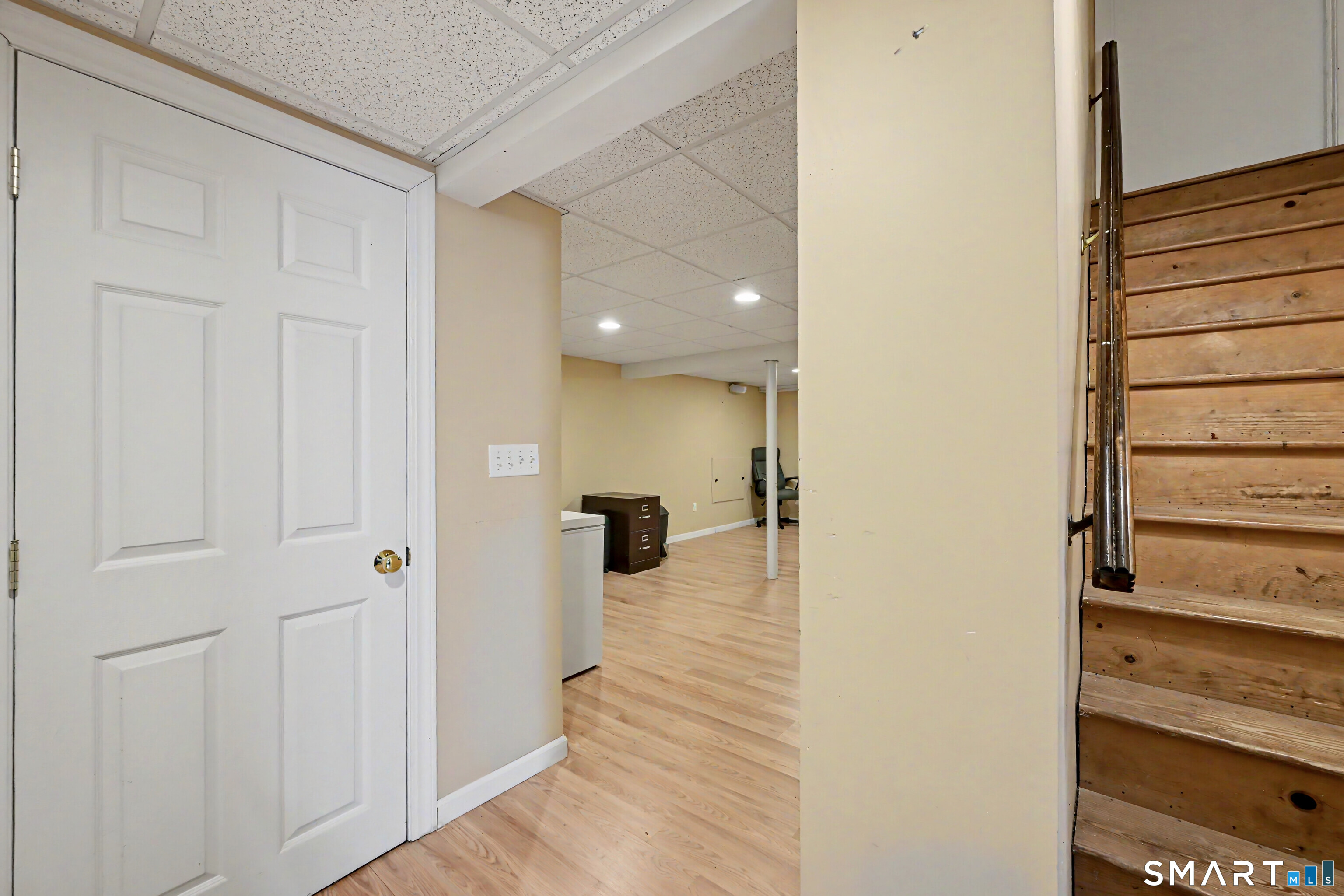 524 Ferry Road Orange, CT 06477 - Photo 31 of 40 a view of a hallway with wooden floor