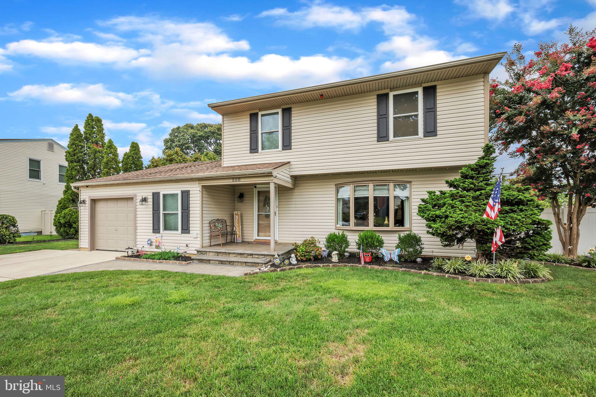 550 Sherry Drive Runnemede, NJ 08078 - Photo 1 of 28 a front view of a house with a yard and trees