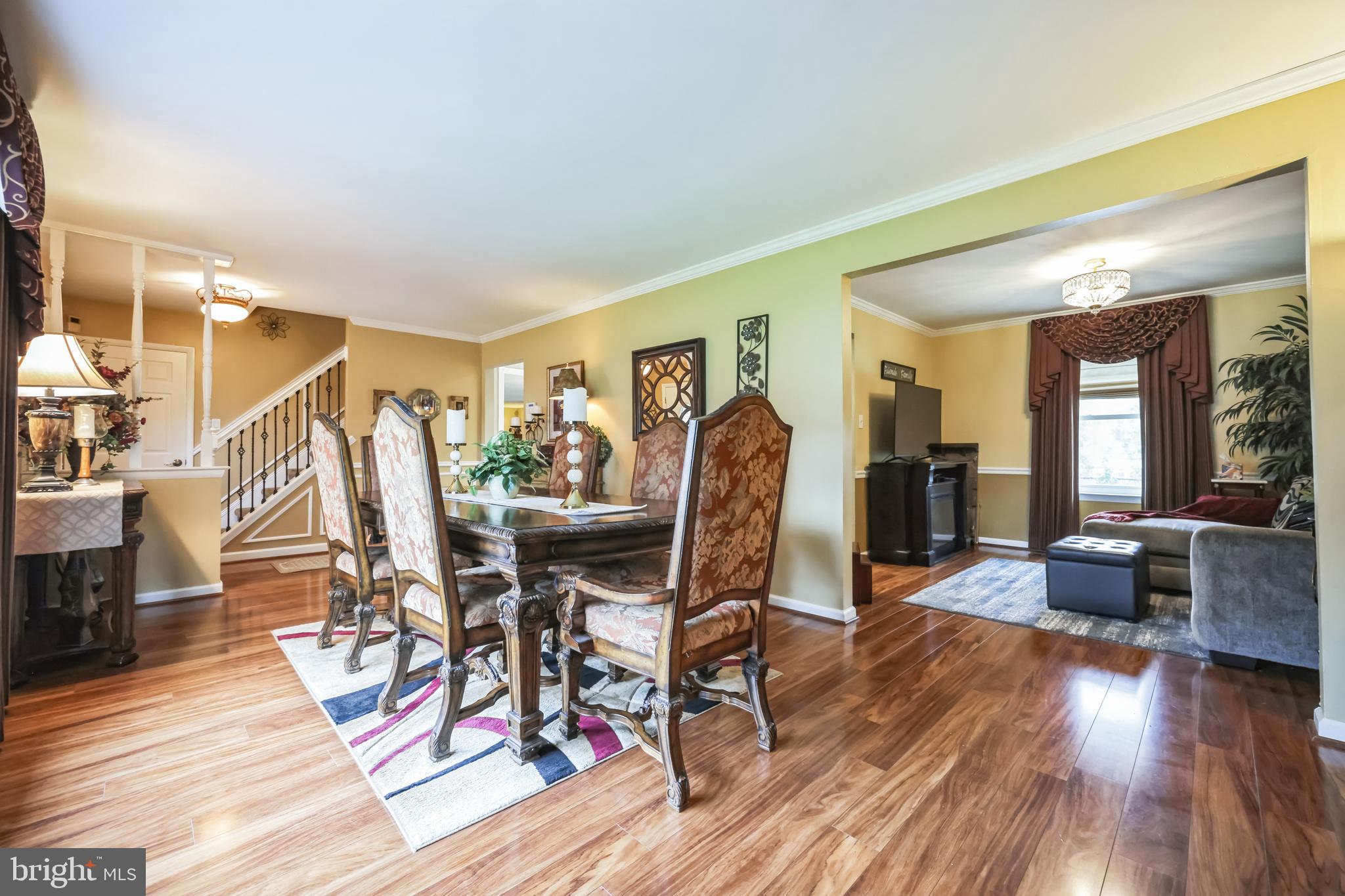550 Sherry Drive Runnemede, NJ 08078 - Photo 3 of 28 a view of a livingroom with furniture and wooden floor
