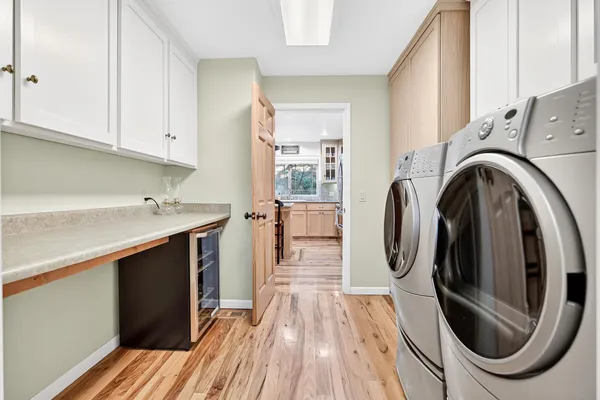 a white toilet sitting next to a bathroom sink