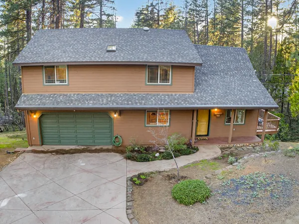 front view of a house with a yard