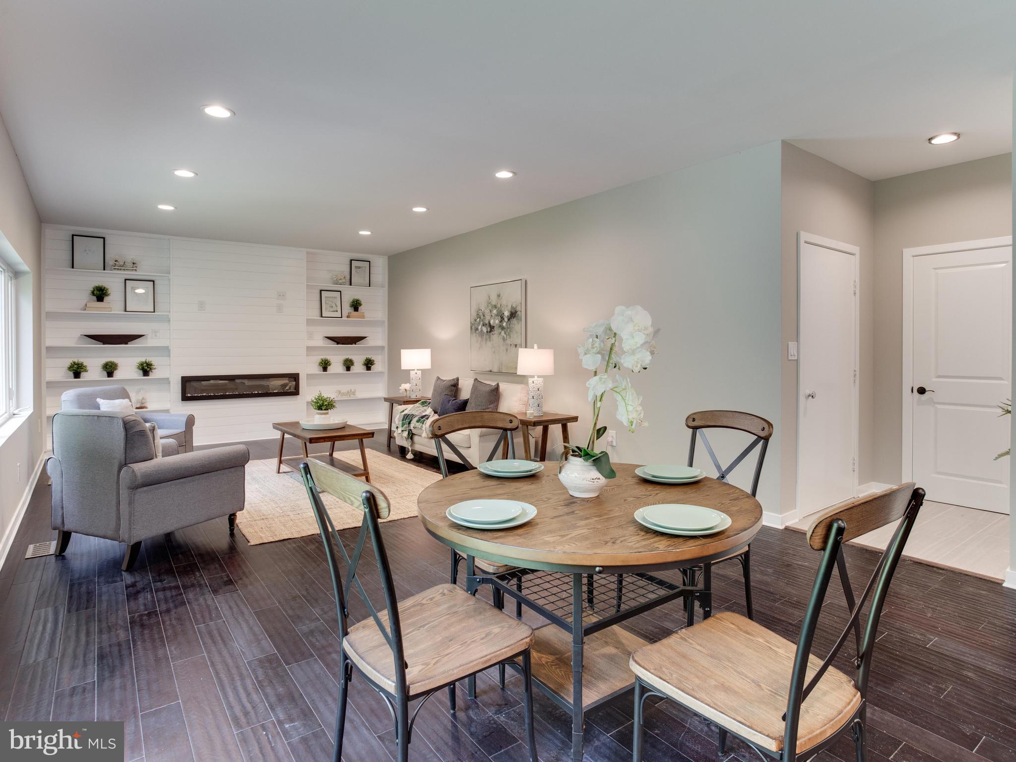 1510 Lottie Fowler Road Prince Frederick, MD 20678 - Photo 10 of 30 a view of a dining room with furniture and wooden floor
