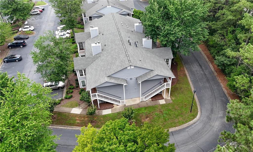 1007 Olde Mill Lane Norcross, GA 30093 - Photo 2 of 32 an aerial view of a house with a yard
