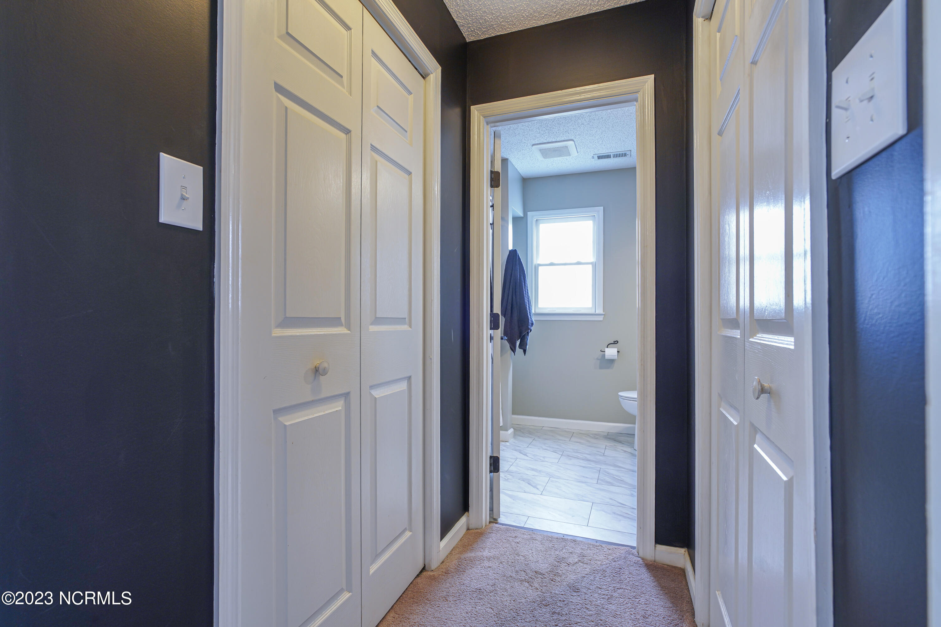 203 Willbarry Road Jacksonville, NC 28540 - Photo 23 of 62 Master hall to bath with dual closets