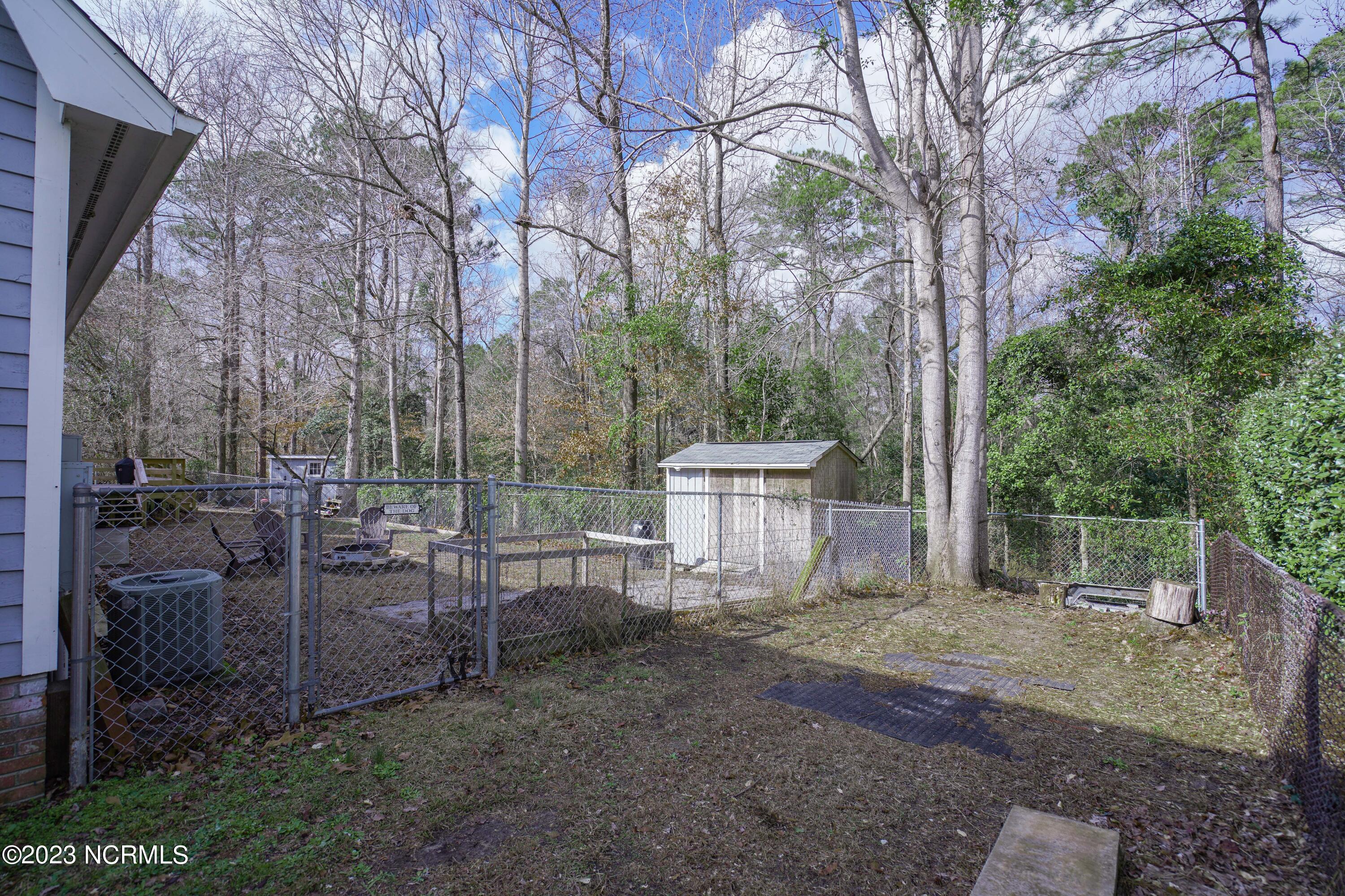 203 Willbarry Road Jacksonville, NC 28540 - Photo 57 of 62 Parking next to and behind garage