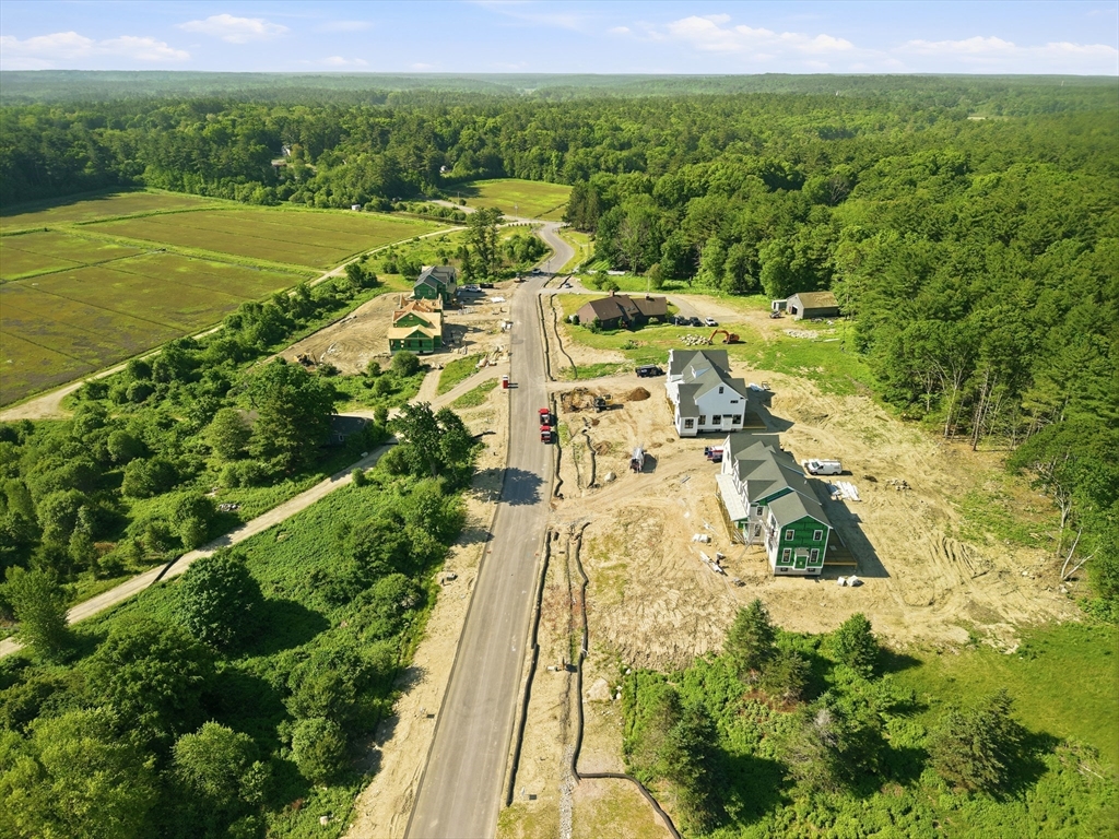 6 Webster Farm Way Norwell, MA 02061 - Photo 5 of 7 a view of a city with lush green forest