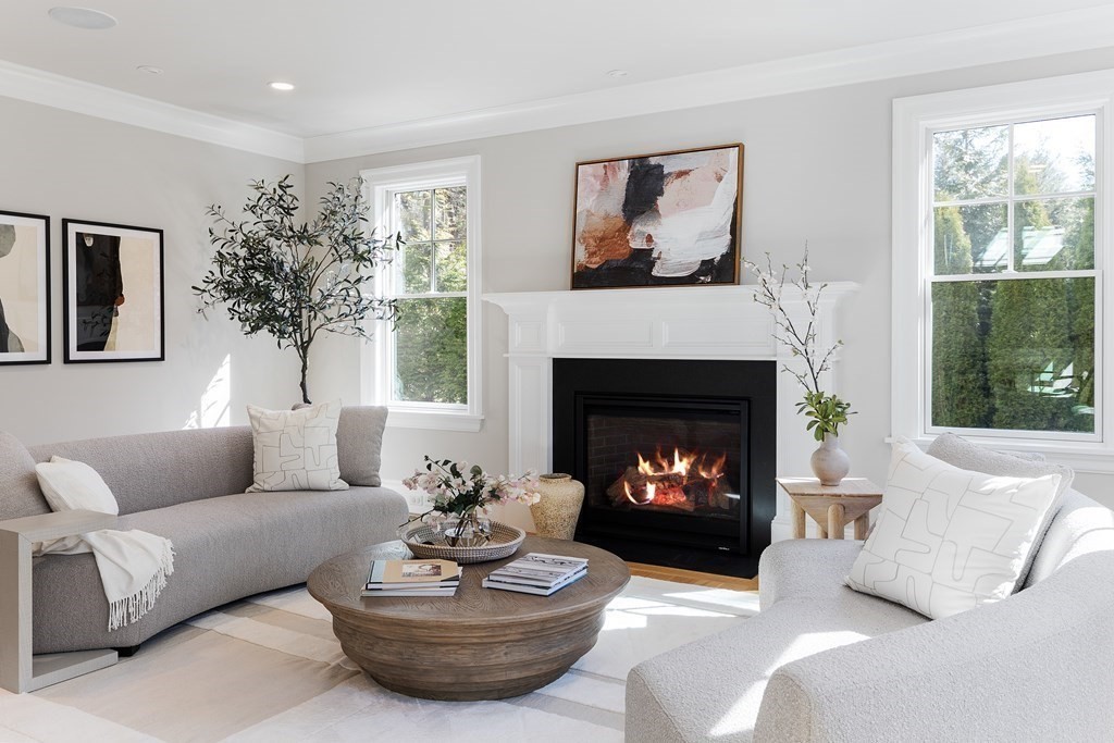 19 Longmeadow Road Wellesley, MA 02482 - Photo 11 of 34 a living room with furniture a window and a fireplace