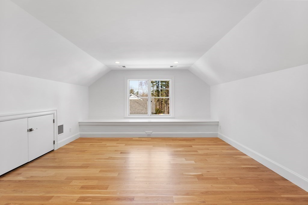 19 Longmeadow Road Wellesley, MA 02482 - Photo 27 of 34 a view of empty room with wooden floor and fan