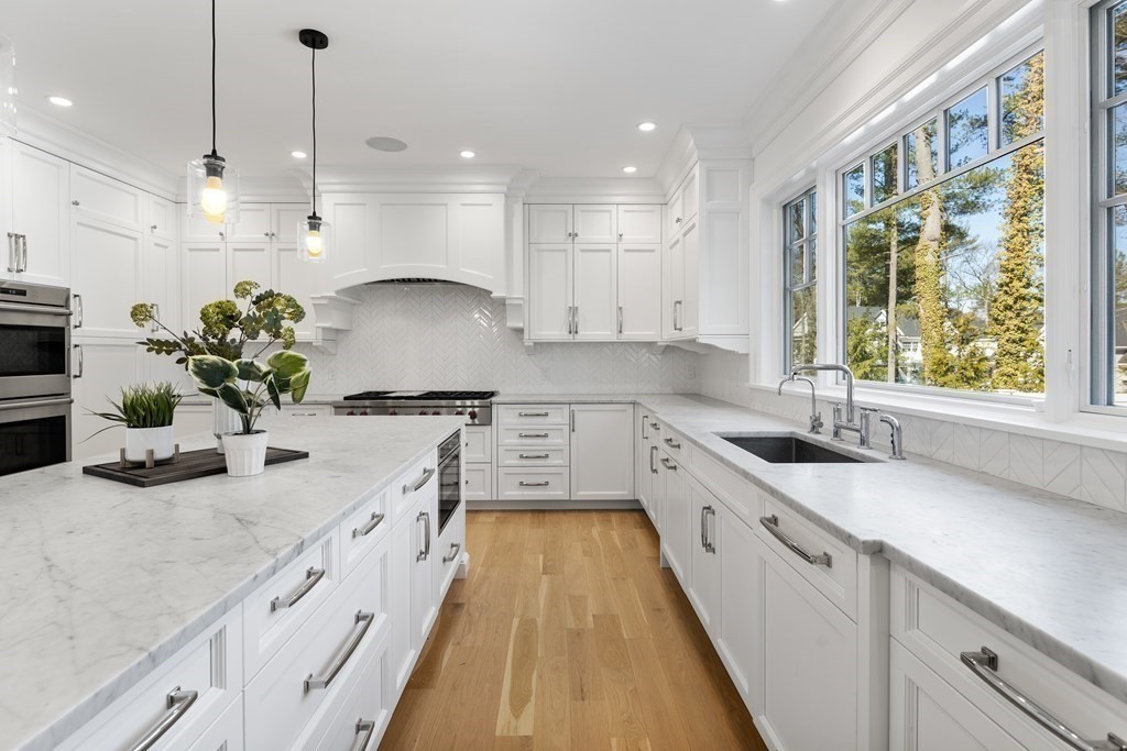 19 Longmeadow Road Wellesley, MA 02482 - Photo 4 of 34 a large kitchen with kitchen island granite countertop lots of counter space and window