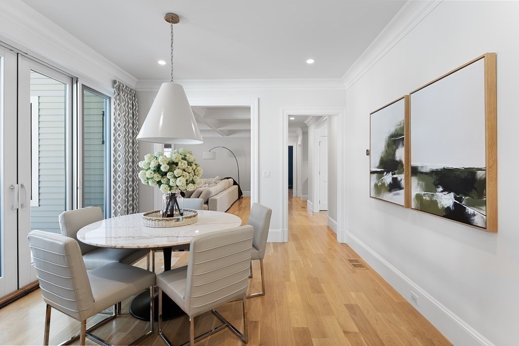 19 Longmeadow Road Wellesley, MA 02482 - Photo 7 of 34 a view of a dining room with furniture and a potted plant