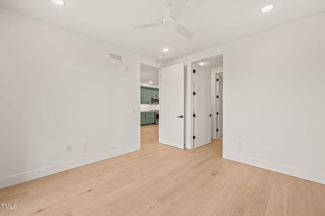 a bathroom with a double vanity sink mirror and shower