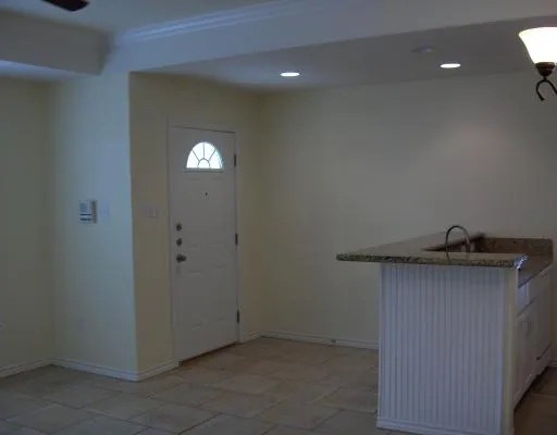 a view of storage and utility room with a sink