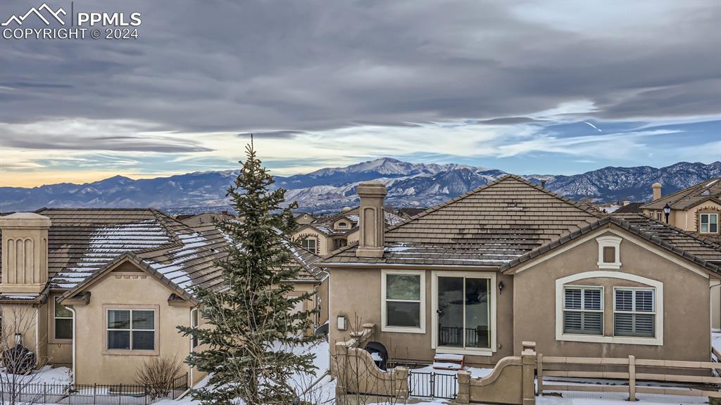 2644 Cinnabar Road Colorado Springs, CO 80921 - Photo 12 of 22 a front view of a house with a yard and balcony
