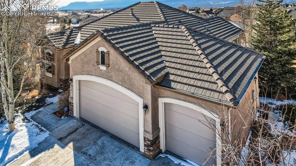 2644 Cinnabar Road Colorado Springs, CO 80921 - Photo 2 of 22 a view of a house with a white door and wooden fence