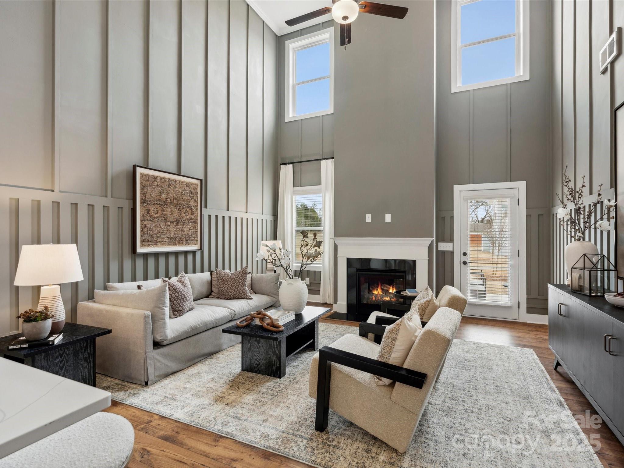 1018 Puddle Pond Road Indian Trail, NC 28079 - Photo 12 of 34 a living room with furniture and a fireplace